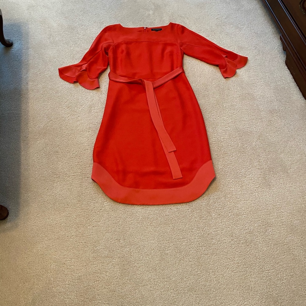 Red sheath dress w/scoop hem & ruffled sleeves